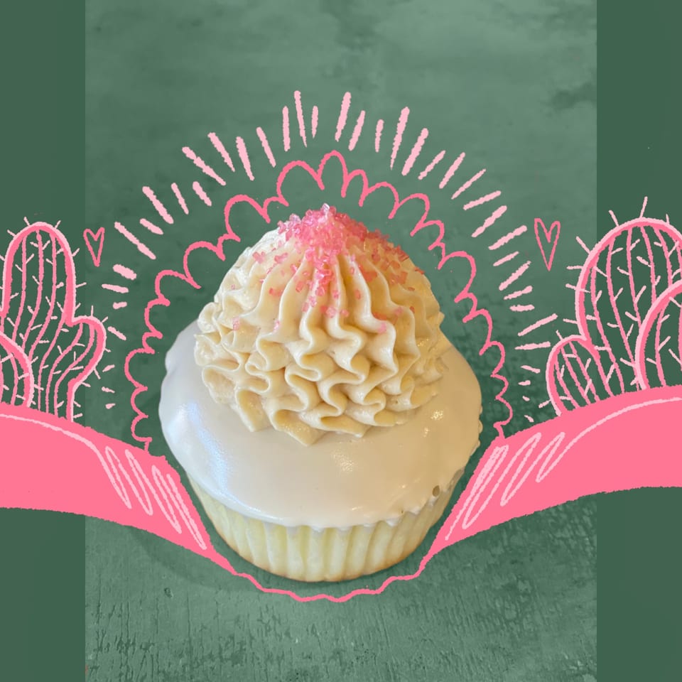 Sweetspot cupcake with white frosting and pink sprinkles, surrounded by pink desert-themed doodles.